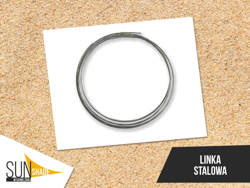 Linka stalowa w przezroczystej otulinie PVC zwinięta w krąg, przeznaczona do montażu żagli przeciwsłonecznych.